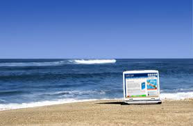 enter sweepstakes on the beach with your laptop