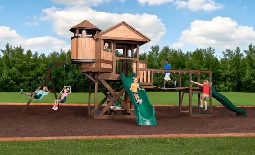 Enter for your chance to win a Backyard Discovery Timber Cove Swing Set including Installation worth $2,699