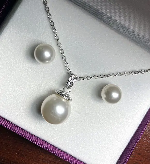 Win a Pearl and Diamond Necklace/Earring Set 